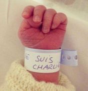 Baby-with-JeSuisCharlie-wrapped-around-arm